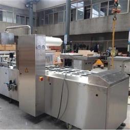 Máy dán khay đóng hộp thực phẩm tự động